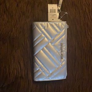 Authentic Michael Kors wristlet. Brand new!